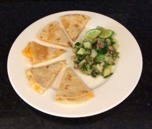 Radish and cucumber pico de gallo with quesadilla